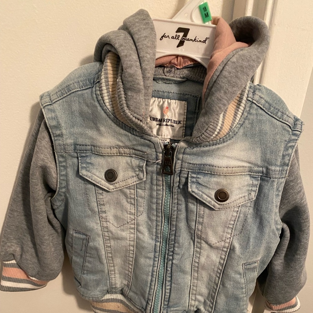 Size 18 months denim jacket with detachable hood. New with tags